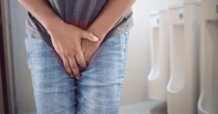 leaking urine after urination female